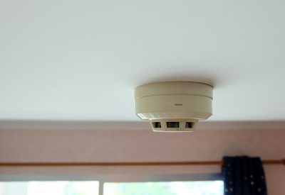 Smoke fire detector inside the condo bedroom, Selectived focus